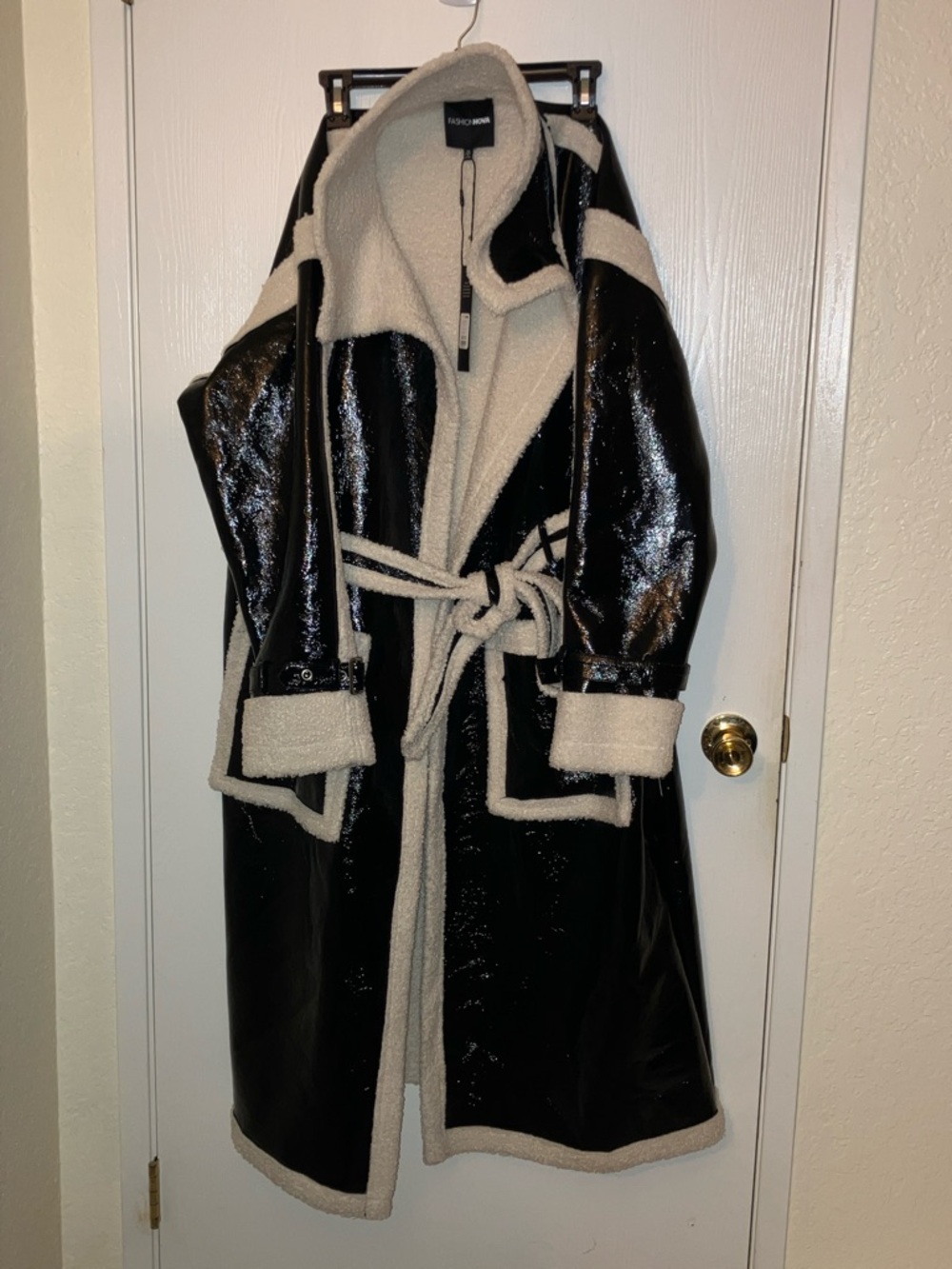 Fashion Nova Black Coat with Cream Faux-Shearling Trim.